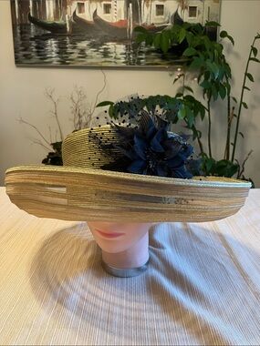 Wide Brim Metallic Gold Straw Hat with Black Flower Accent